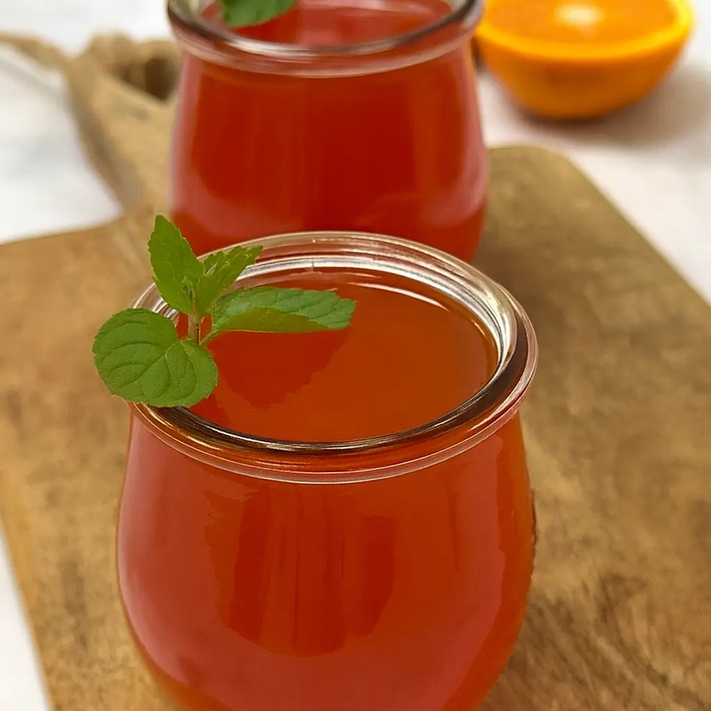 Aperol Gelee im Gläschen mit Deko-Minze