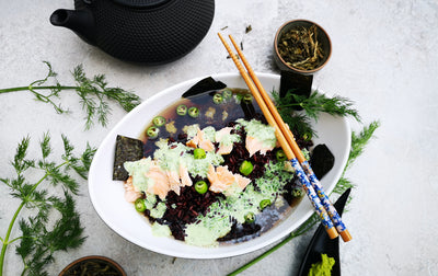 Black rice with salmon and herb sauce